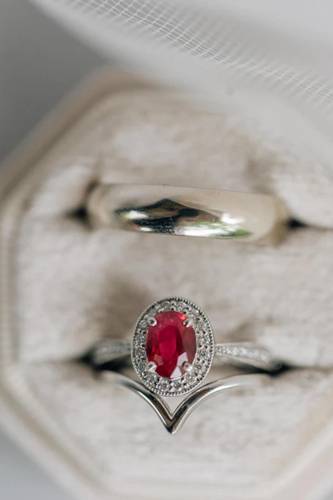 white gold wedding band and ruby fing